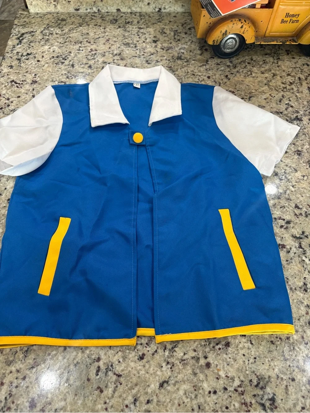 Pokémon Ash Ketchum top in size 140/9-10 year old FUC due to untreated stains